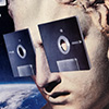 statue of david's head wearing sunglasses made of floppy disks