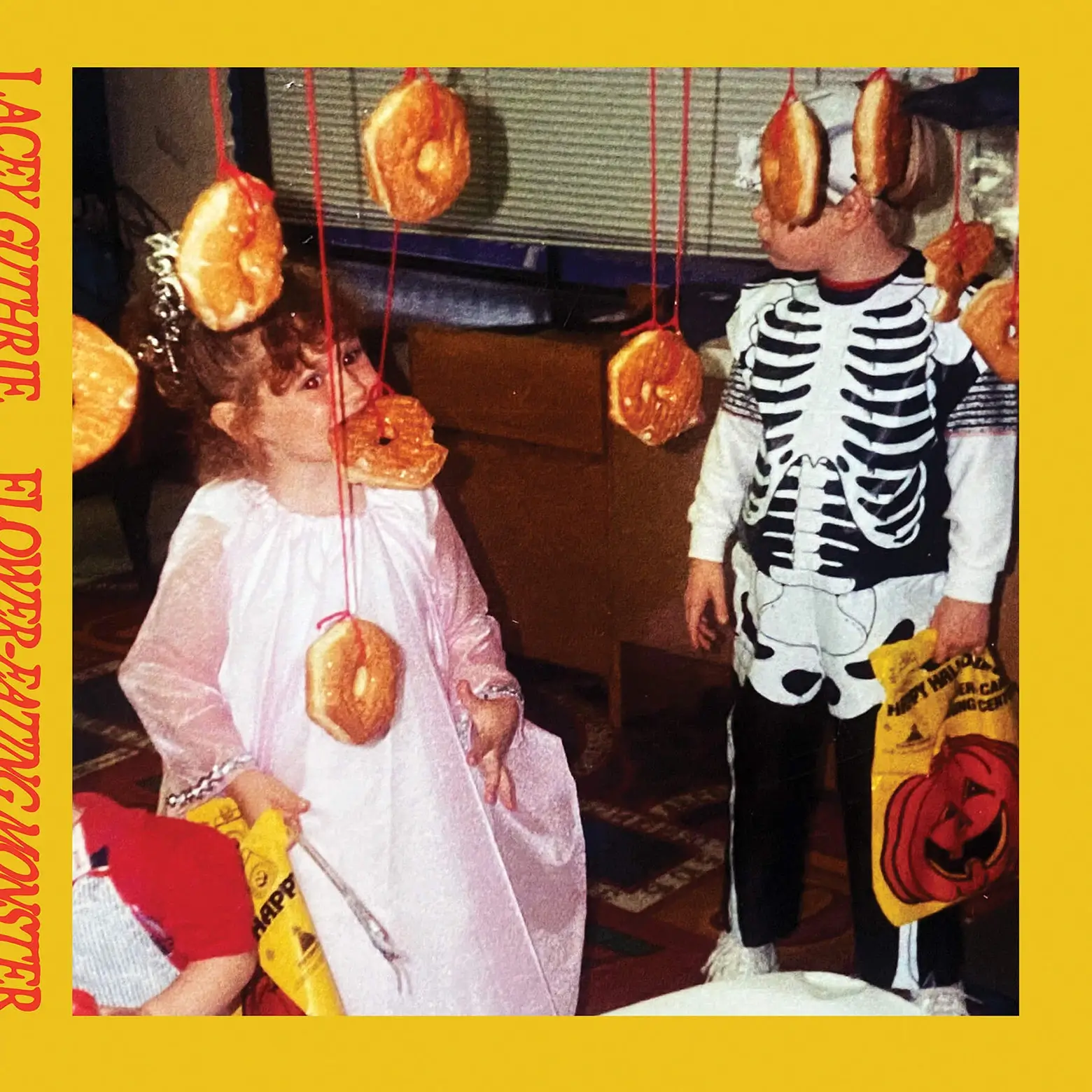 album artwork featuring a photo of me when I was a little girl in a princess outfit biting a donut hanging from a red string.